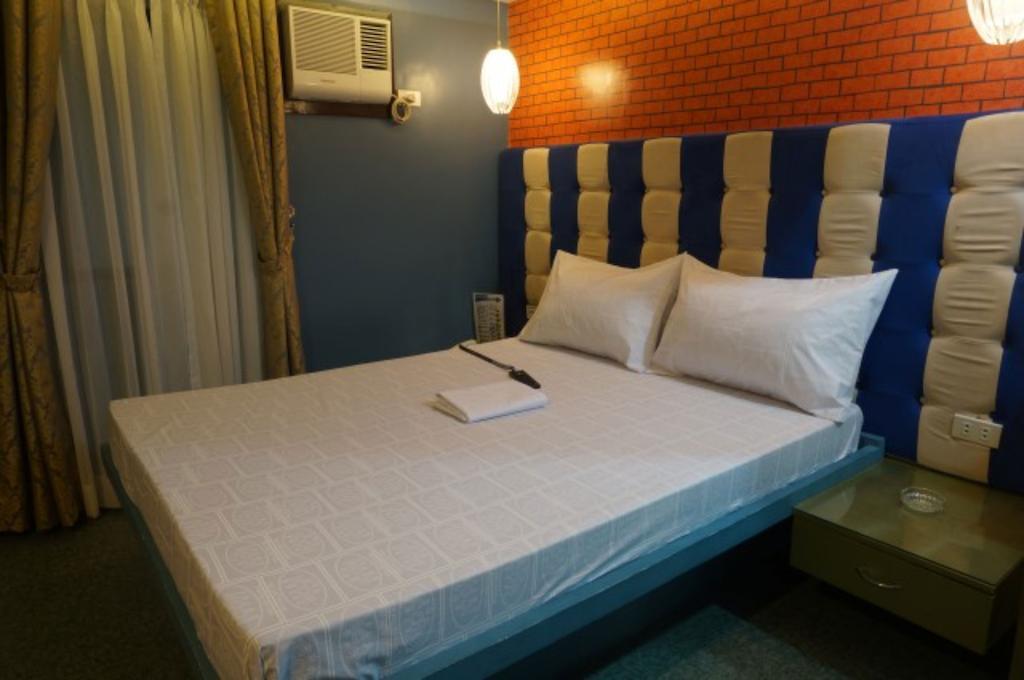 Icon Hotel Manila Szoba fotó